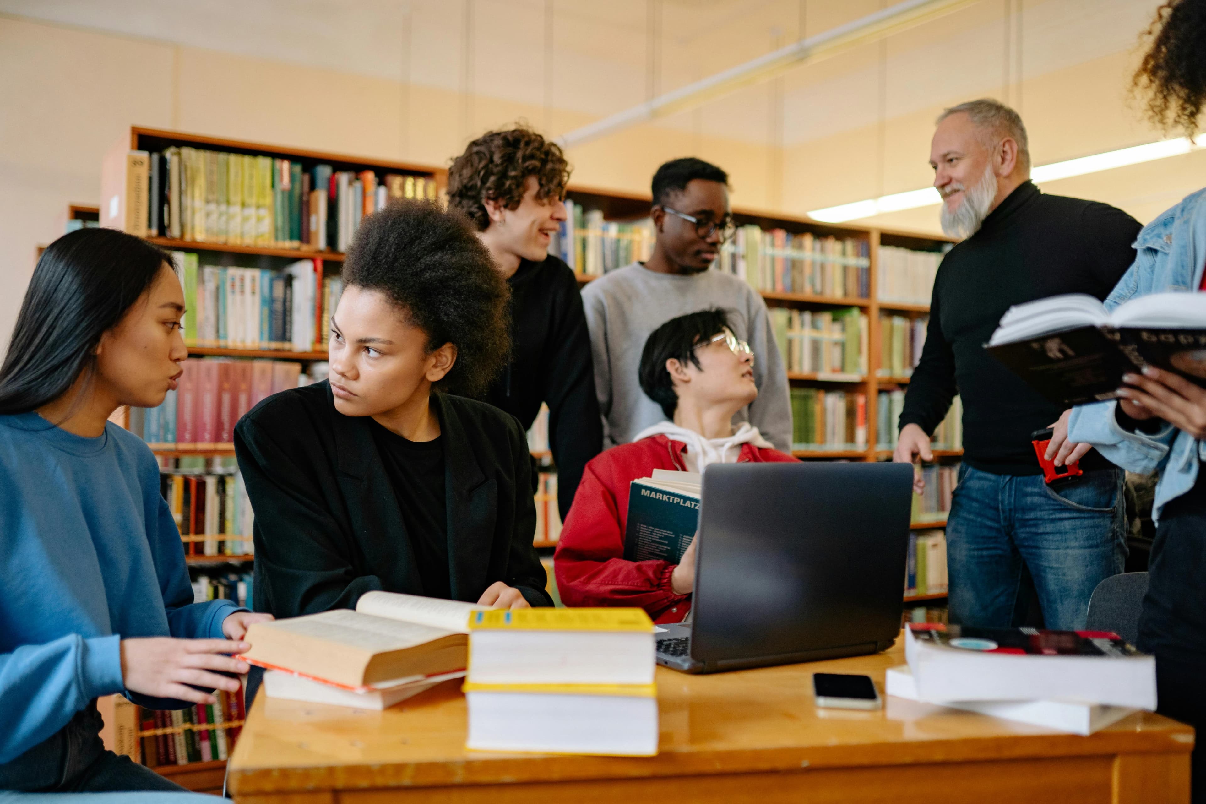 Students studying together in a library